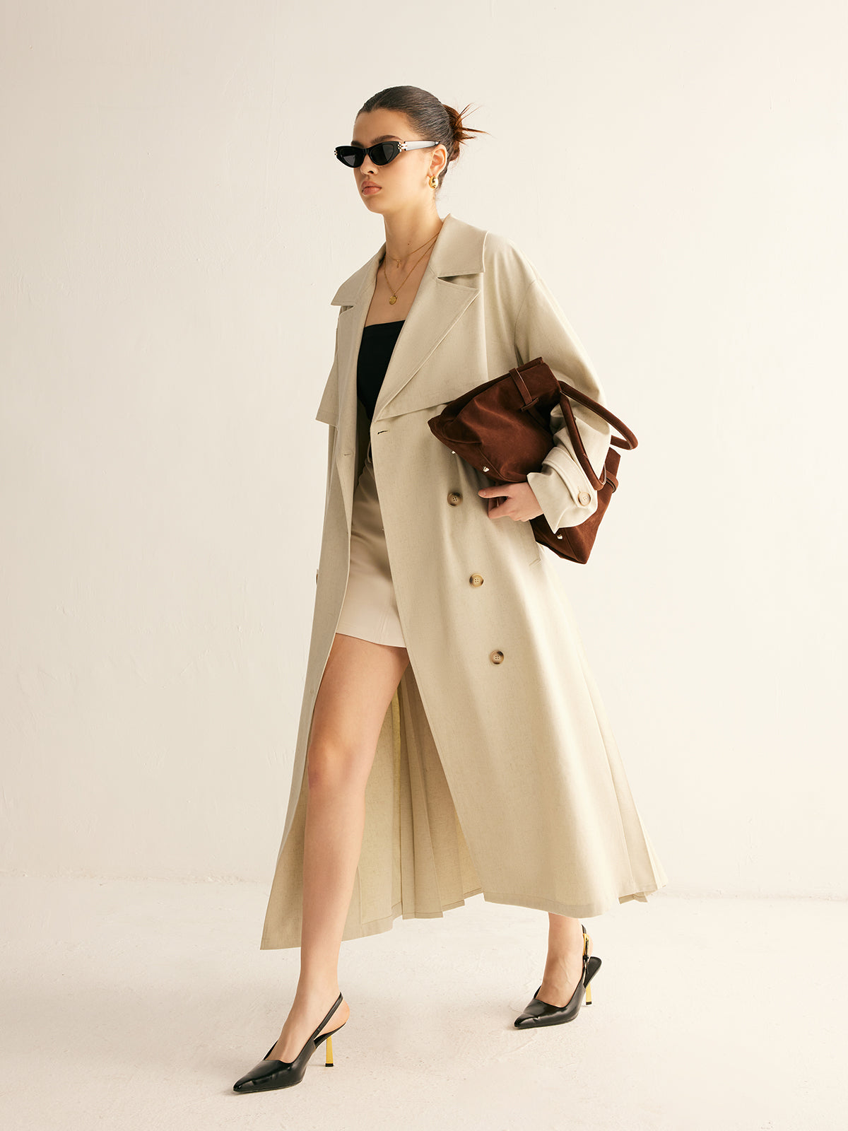 Élégant trench-coat plissé avec ceinture