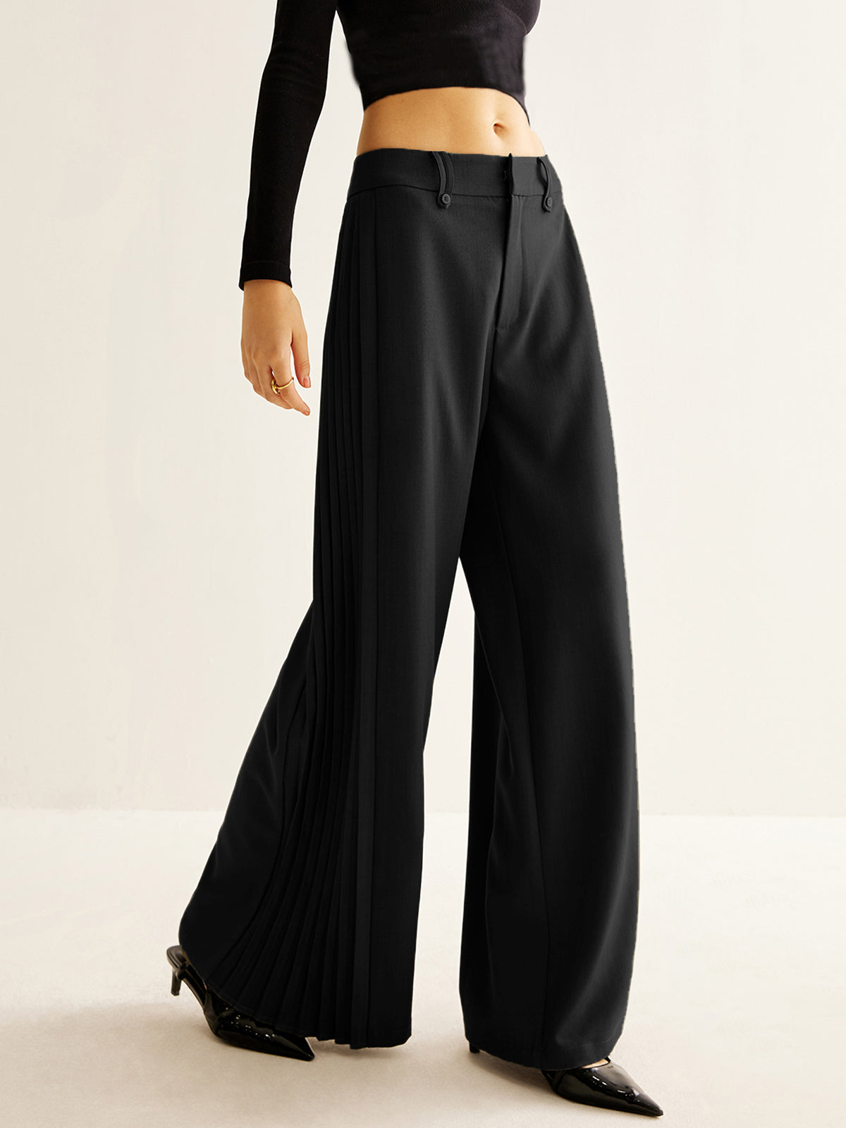 Pantalon large à plis latéraux