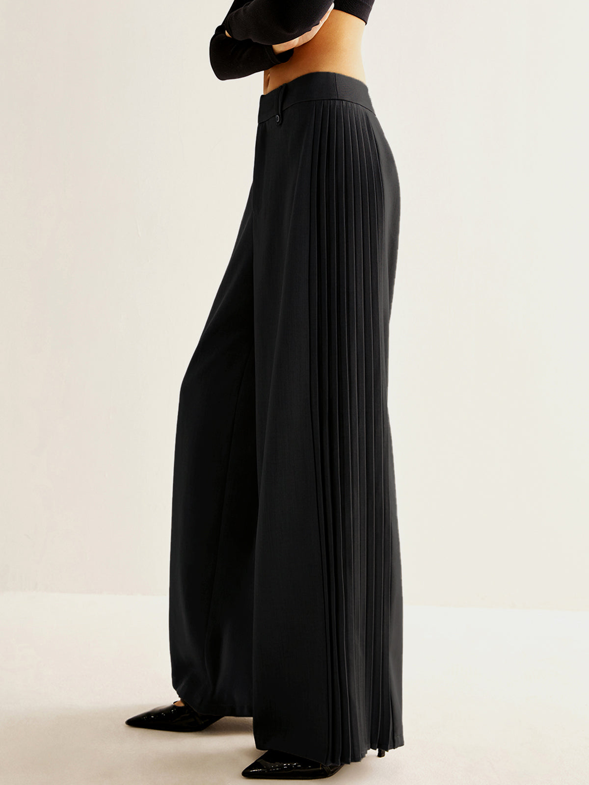 Pantalon large à plis latéraux