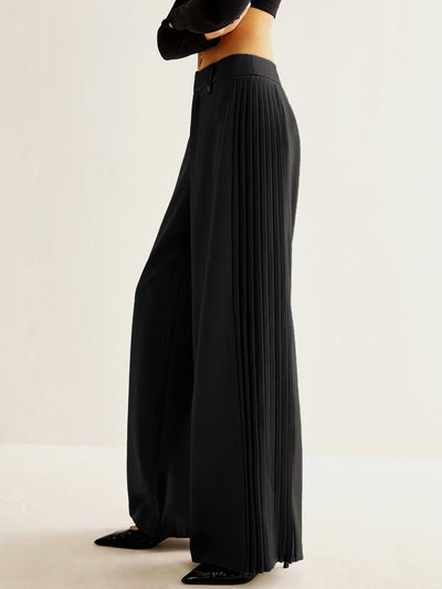 Pantalon large à plis latéraux