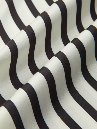 Blouse confortable à boutons et rayures satinées