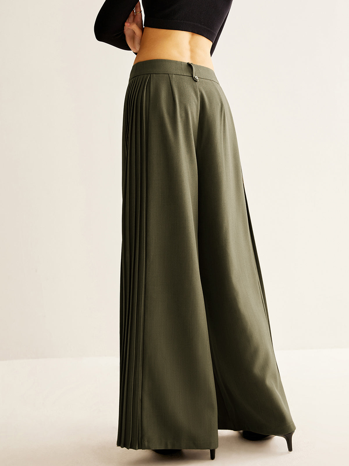 Pantalon large à plis latéraux