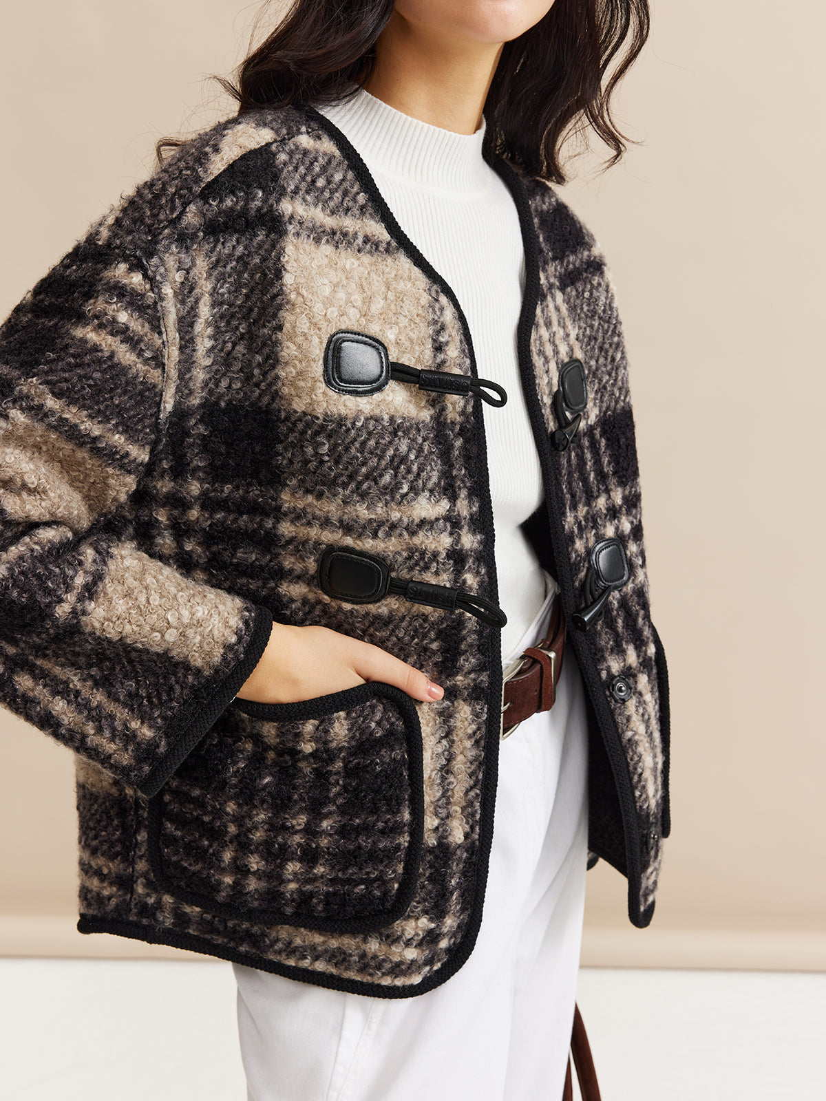 Manteau en tweed à carreaux contrastés