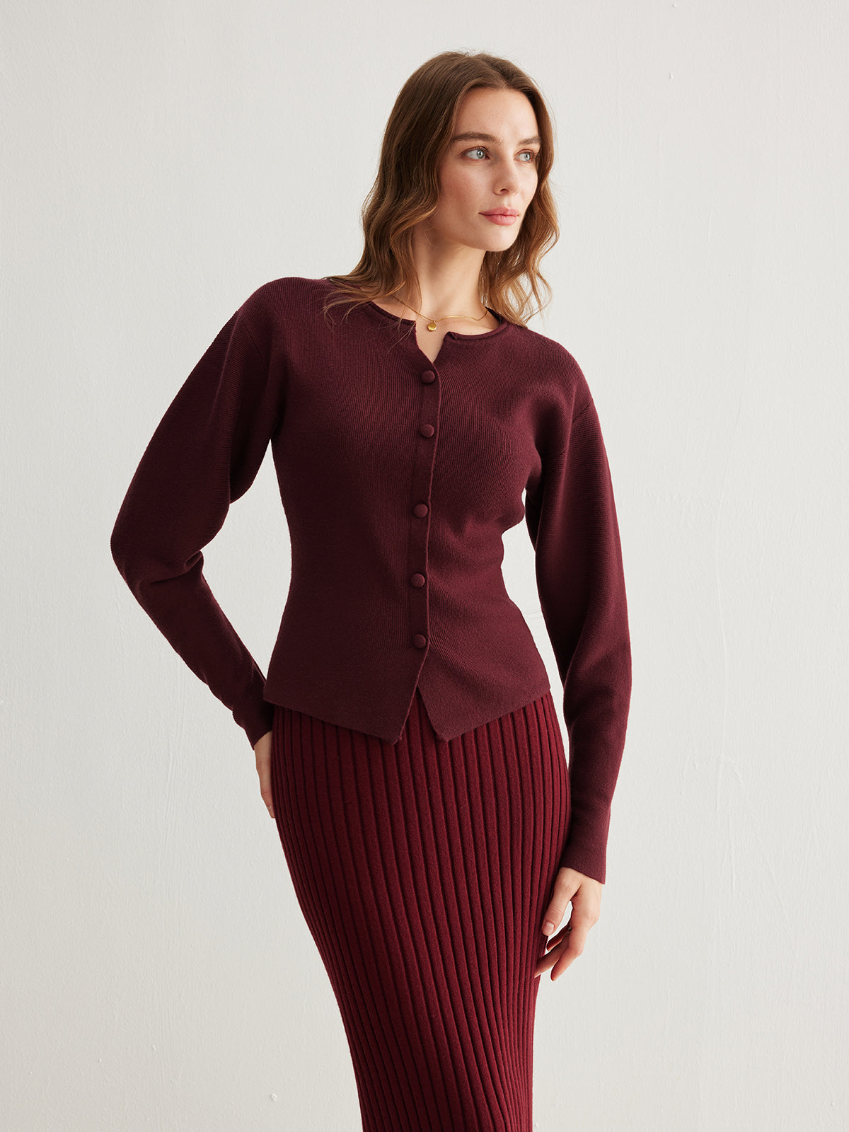 Pull côtelé à boutons et fente