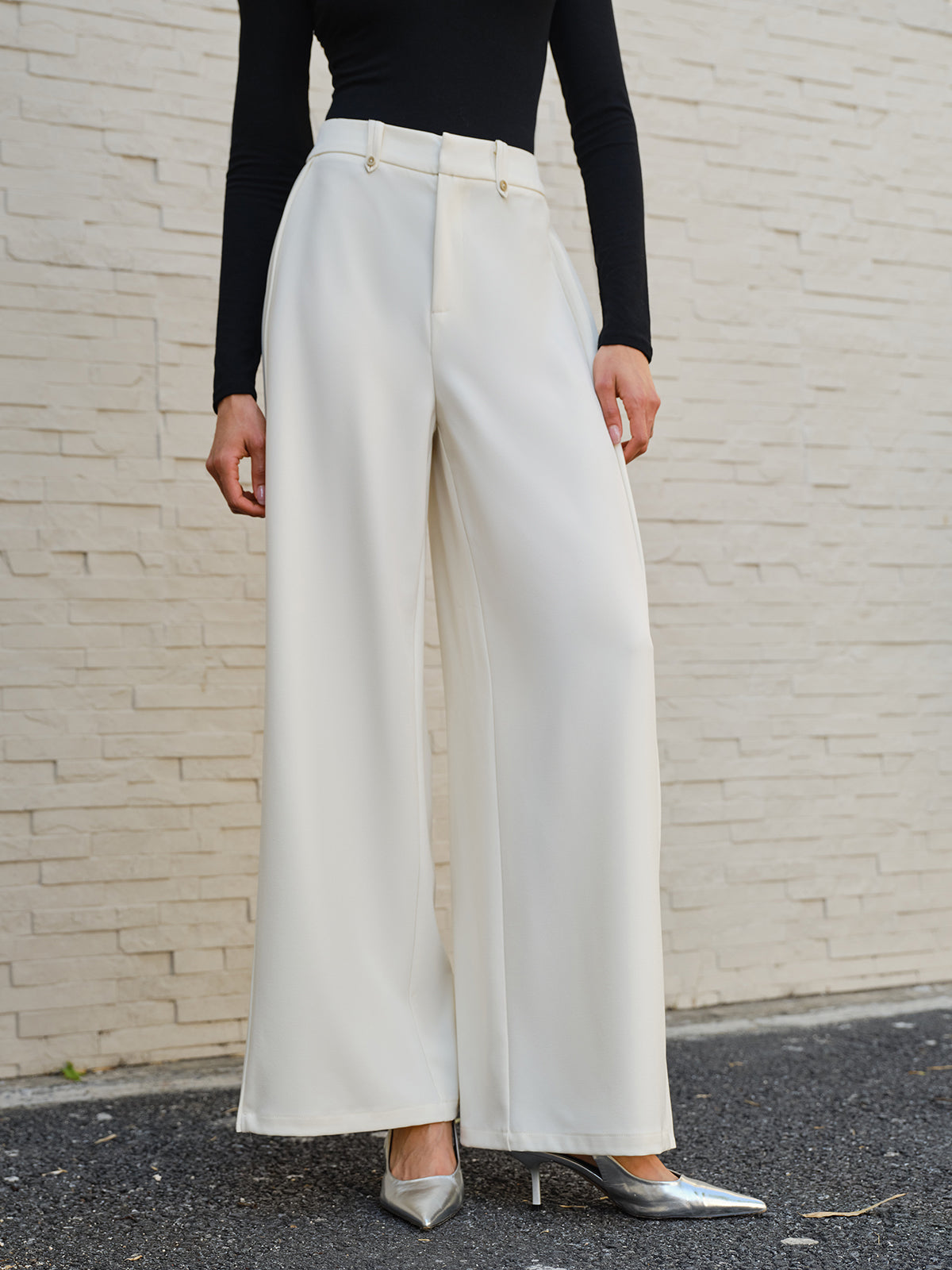 Pantalon large à plis latéraux