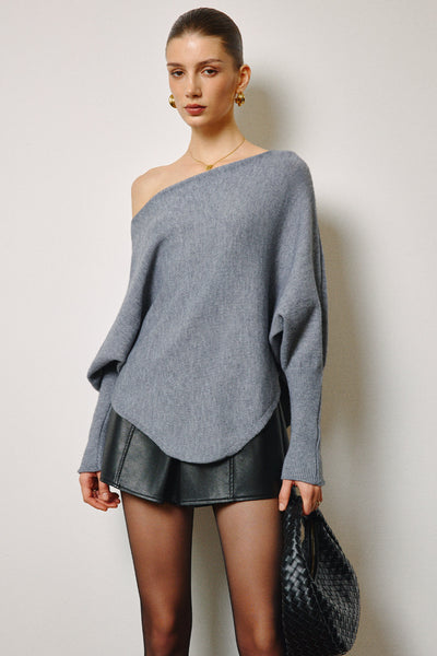 Pull oversize à col asymétrique et manches bouffantes