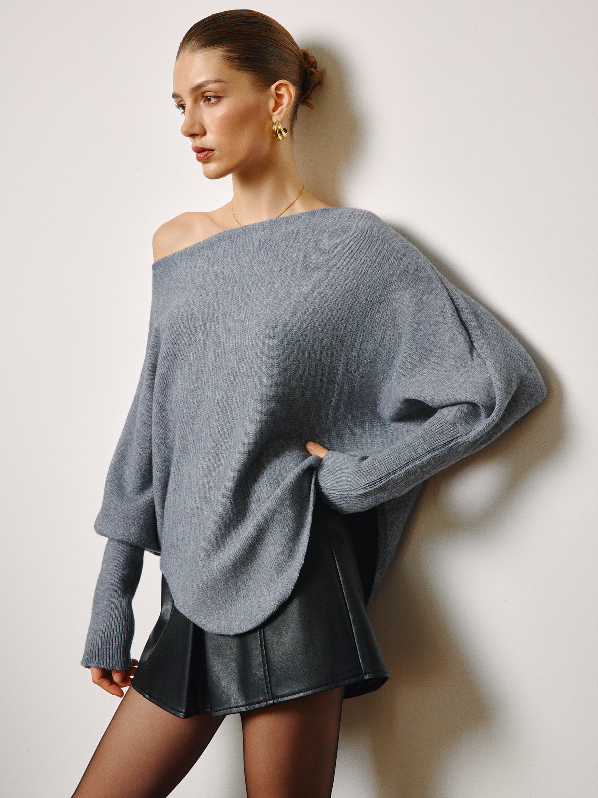Pull oversize à col asymétrique et manches bouffantes