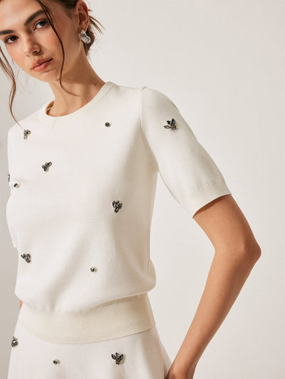 Pull à manches courtes avec détails métalliques