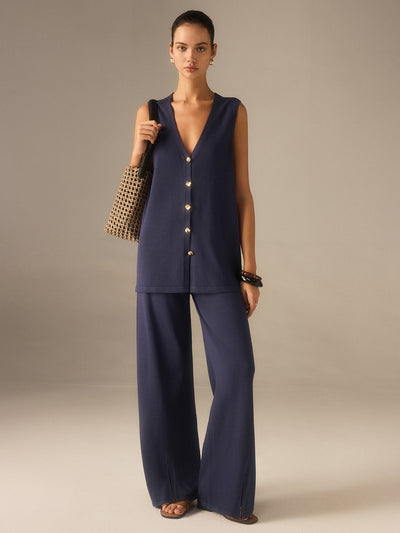 Ensemble gilet-pantalon en tricot à boutons dorés