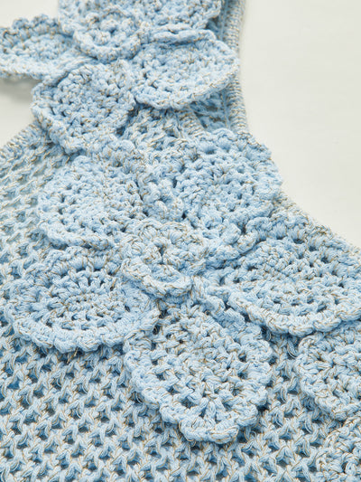 Haut asymétrique à fleurs en maille crochetée